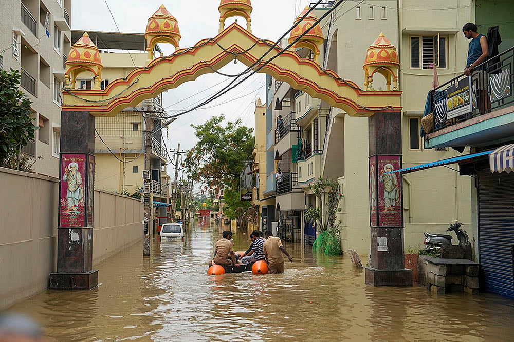 Bengaluru weather Heavy Rain 100mm Rainfall Floods the City