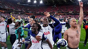 Photo: AP : Tottenham players celebrate their victory after the Europa League final against Manchester United at the San Mames Stadium in Bilbao, Spain.