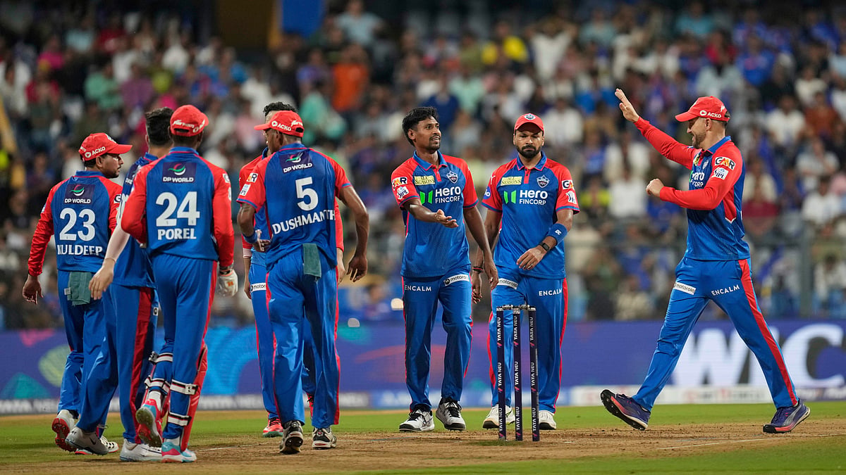 Delhi Capitals Mustafizur Rahman, third right, celebrates the dismissal of /Mumbai Indians' Rohit Sharma during the Indian Premier League cricket match between Mumbai Indians and Delhi Capitals at Wankhede Stadium in Mumbai, India, Wednesday, May 21, 2025. 
 - (AP Photo/Rajanish Kakade)