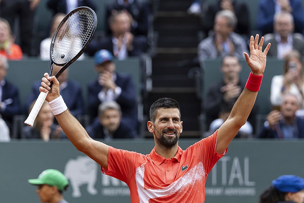 | Photo: Cyril Zingaro/Keystone via AP : ATP Geneva Open: Novak Djokovic vs Marton Fucsovics