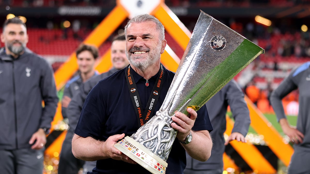 Ange Postecoglou lifting the Europa League trophy