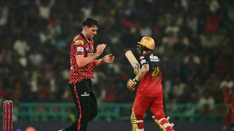 Sunrisers Hyderabads captain Pat Cummins celebrates the dismissal. AP