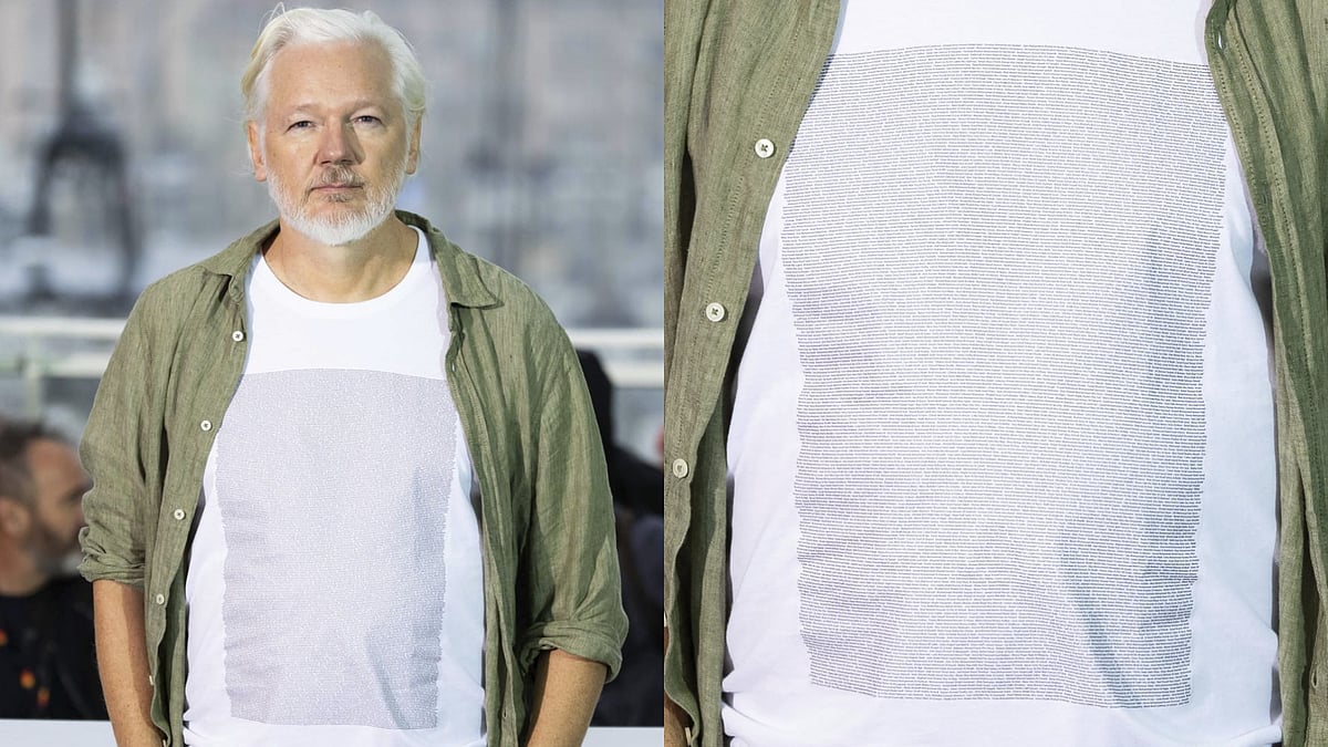 AP : Julian Assange poses during a photocall for the documentary film The Six Billion Dollar Man