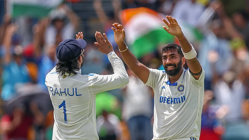 Indias Jasprit Bumrah, right, and KL Rahul celebrate. AP