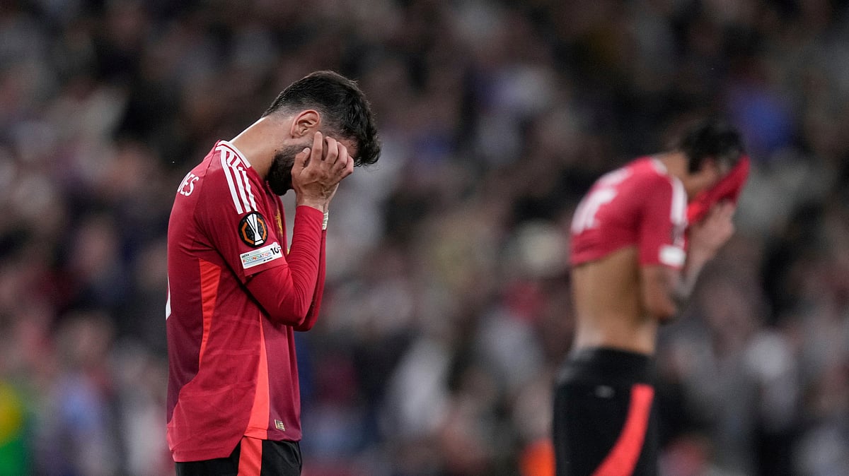 AP Photo/Bernat Armangue : Manchester United reacts at the end of the Europa League final football match between Tottenham Hotspur and Manchester United at the San Mames Stadium in Bilbao.
