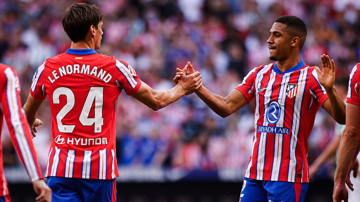 | Photo: X/atletienglish : Atletico Madrid's Robin Le Normand celebrates with Samuel Lino after scoring against Real Betis in La Liga 2024-25.