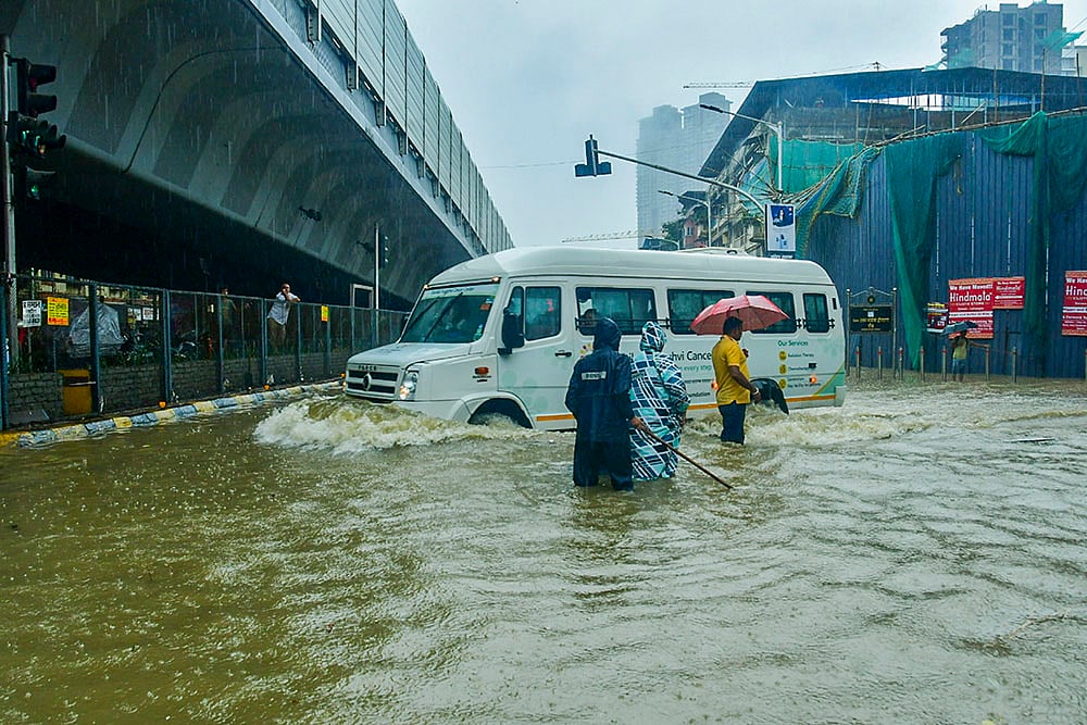 | Photo: PTI : Weather: Rains in Mumbai