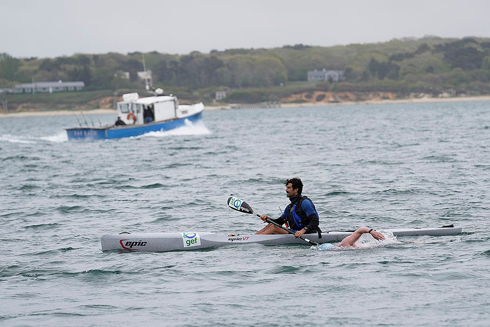 Swimmer Lewis Pugh circumnavigates Marthas Vineyard for sharks_Kayaker Nicholas Burden
