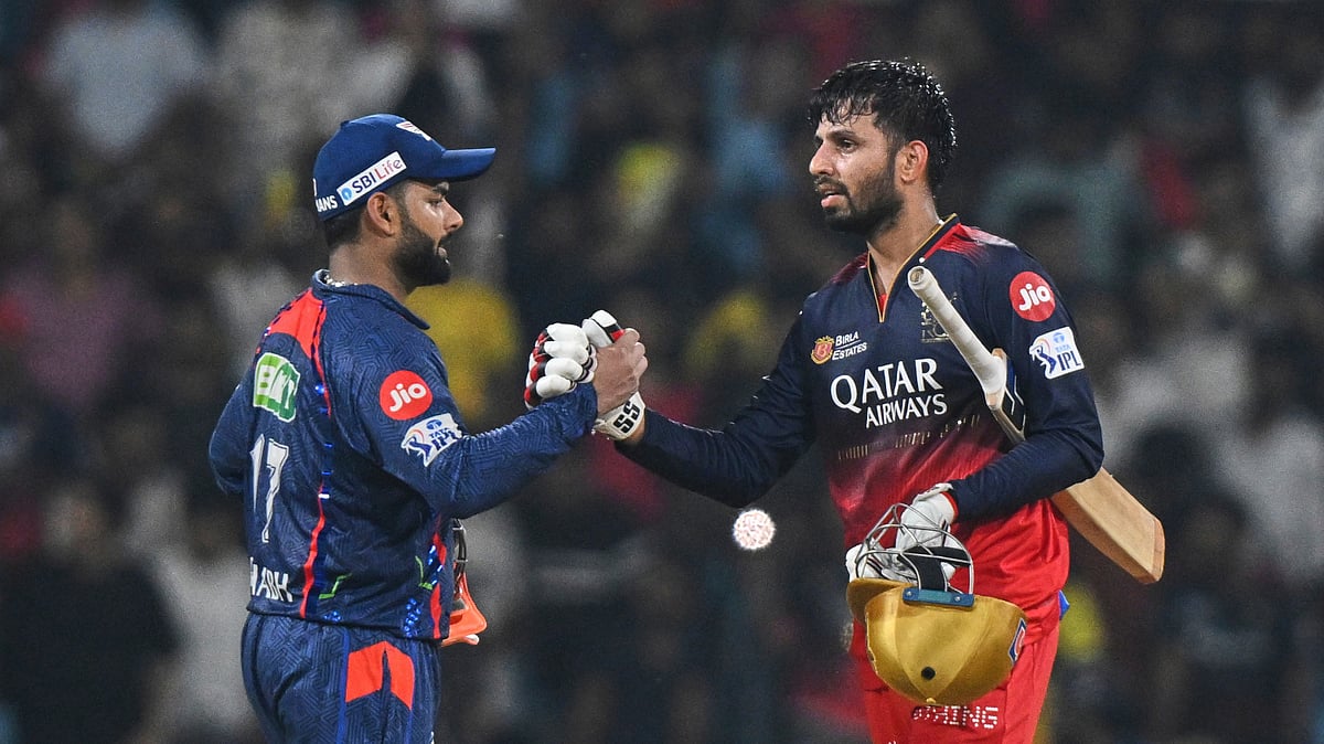 AP Photo : Royal Challengers Bengaluru's Jitesh Sharma shakes hands with Lucknow Super Giants' captain Rishabh Pant after winning the Indian Premier League cricket match against Lucknow Super Giants at Atal Bihari Vajpayee Ekana Cricket Stadium in Lucknow.