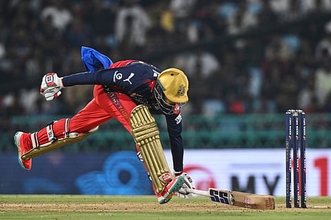 Royal Challengers Bengaluru's Jitesh Sharma successfully completes a run during the Indian Premier League cricket match between Lucknow Super Giants and Royal Challengers Bengaluru at Atal Bihari Vajpayee Ekana Cricket Stadium in Lucknow, India, Tuesday, May 27, 2025. 

