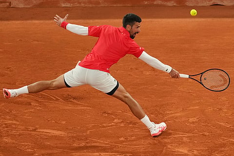 Mackie McDonald vs Novak Djokovic