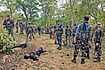 Photo: PTI : Striking Hard: Security personnel at the site where a Maoist commander was killed in Palamu, Jharkhand on May 27