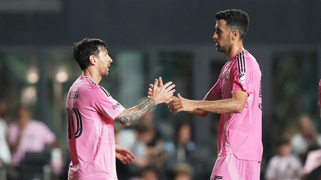 Inter Miami forward Lionel Messi (10) with teammate Sergio Busquets after scoring a goal during the first half of an MLS soccer match against CF Montreal, Wednesday, May 28, 2025, in Fort Lauderdale. - AP/Lynne Sladky