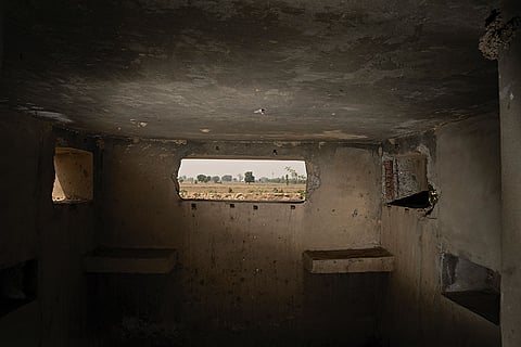 Constricted View: View from a bunker overlooking a farm 
in Punjab