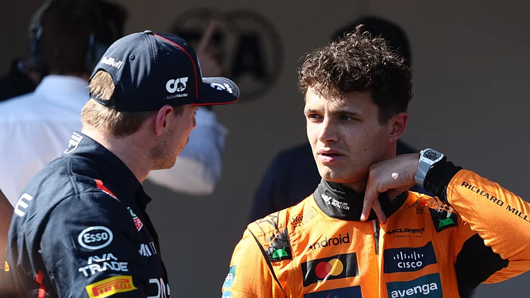 Max Verstappen and Lando Norris - null