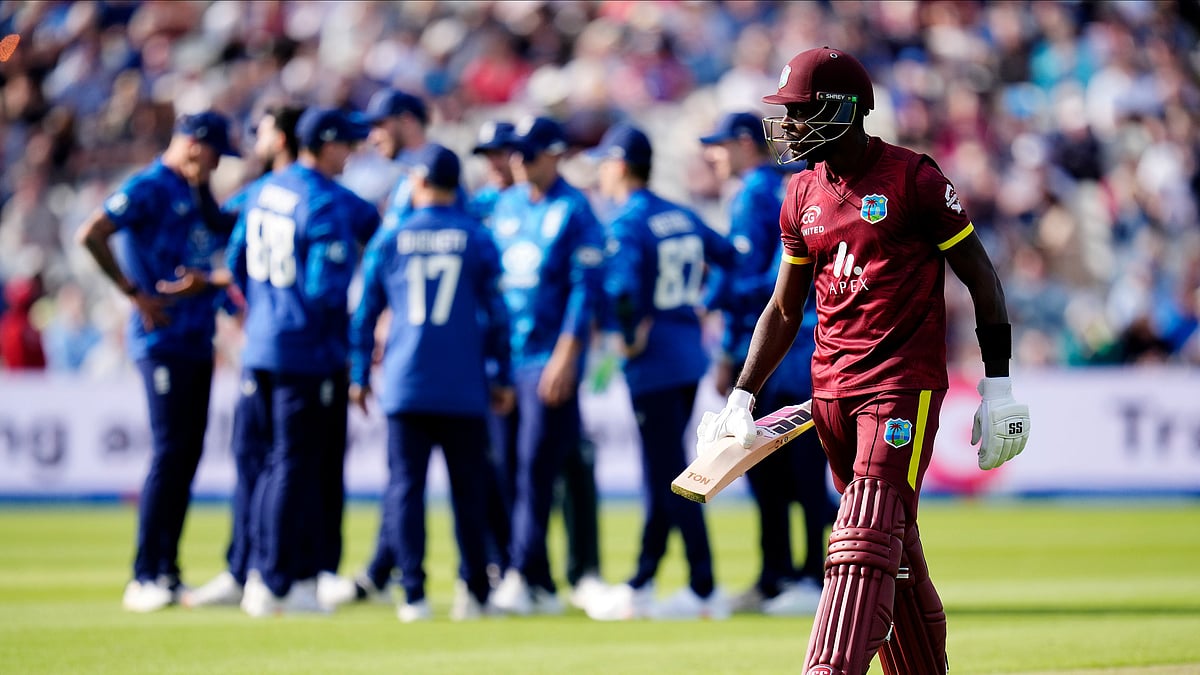 Nick Potts/PA via AP : West Indies' Justin Greaves leaves the field after being bowled out by England's Saqib Mahmood during the first One Day International match between England and West Indies at Edgbaston, Birmingham.