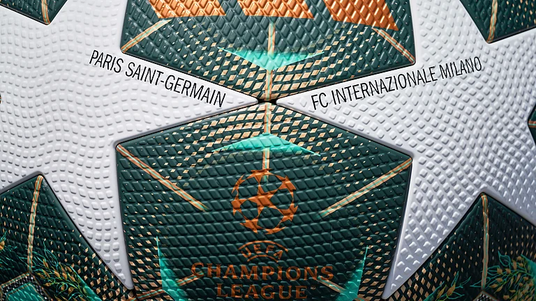A large replica of the official match ball is placed at the Allianz Arena grounds on the eve of the UEFA Champions League 2025 final. Paris Saint-Germain take on Inter Milan in the UCL final on May 31, 2025. - AP/Matthias Schrader