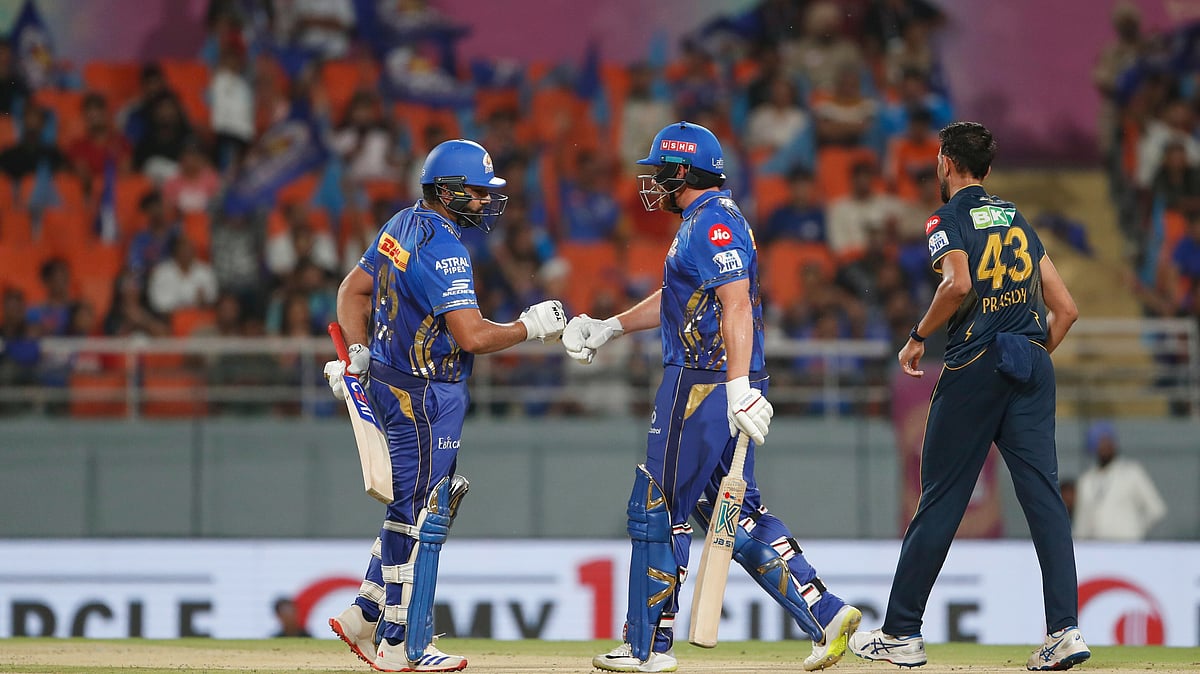 AP Photo : Mumbai Indians' Rohit Sharma, left, and batting partner Jonny Bairstow celebrate scoring runs during the Indian Premier League eliminator cricket match in Mohali.
