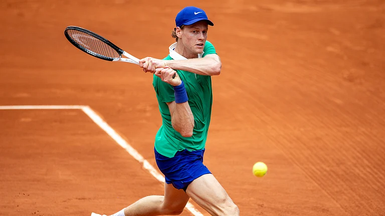 Jannik Sinner in action against Jiri Lehecka - null