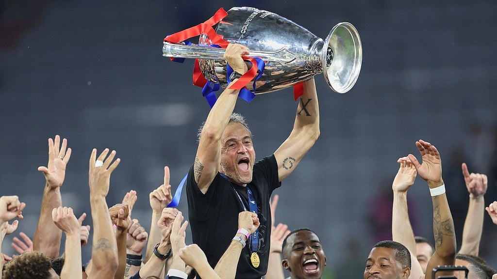 Paris Saint-Germain's head coach Luis Enrique lifts the trophy after the Champions League final against Inter Milan at the Allianz Arena in Munich, Germany. - AP