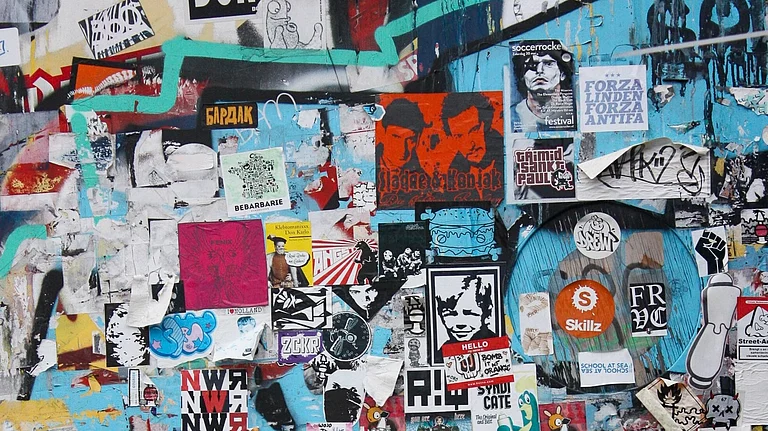 There are different reasons behind the existence of slap stickers. Besides reclaiming the streets and promoting various businesses, they often run commentaries on political issues plaguing the cities they are found in
- Shutterstock