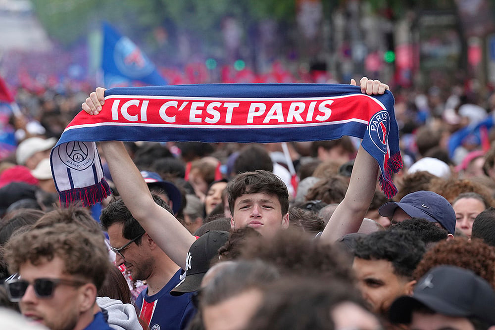 France Soccer Champions League Final PSG Victory Parade in Paris_team motto Here, its Paris