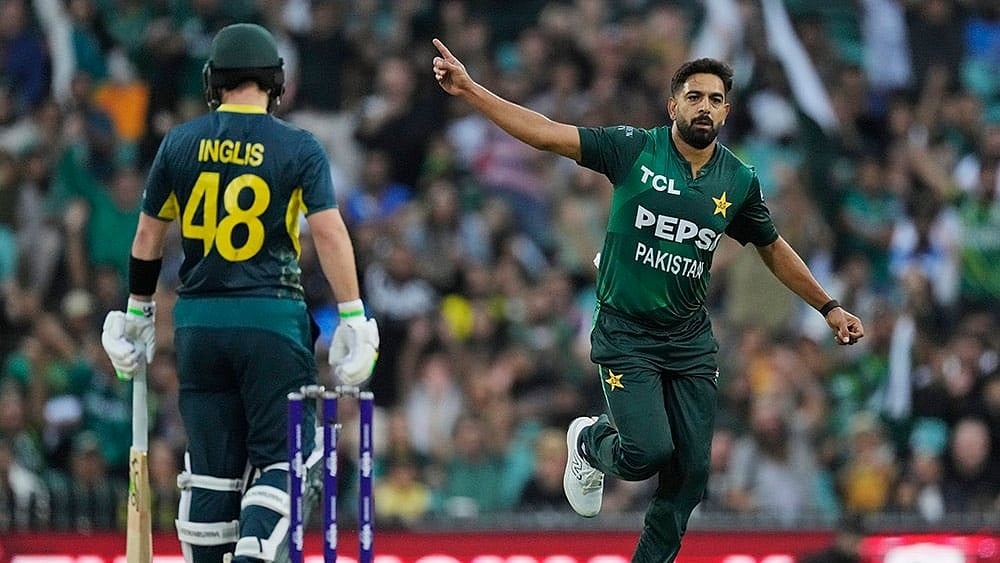 | Photo: AP/Rick Rycroft : Pakistan's Haris Rauf celebrates the wicket of Australia's captain Josh Inglis