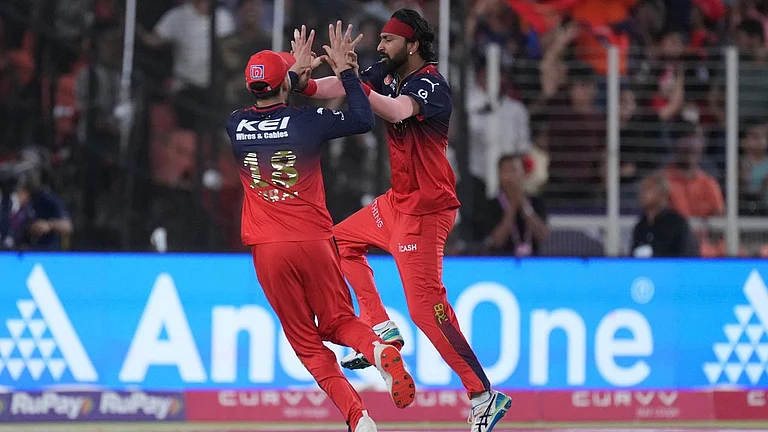 Royal Challengers Bengaluru's Krunal Pandya (right) returned figures of 2/17 in four overs in the IPL 2025 final against Punjab Kings. - AP