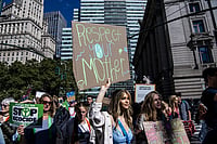 Ecocide: Campaign Pushes To Include Environmental Damage In ICC Crimes | Can Law Alone Bring Change? AP : Activists taking part in protests against ecocide