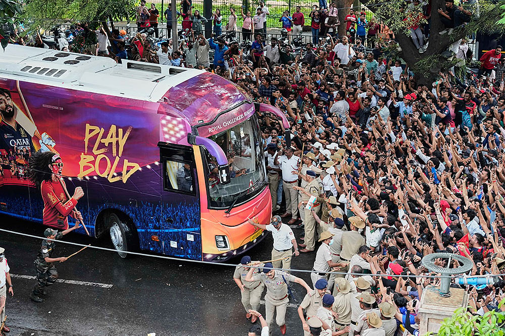 | Photo: AP/Aijaz Rahi : RCB felicitation: Chaos near Bengaluru stadium
