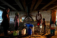 Outlook Photo/ Suresh Pandey : Workers standing on queue to collect water 