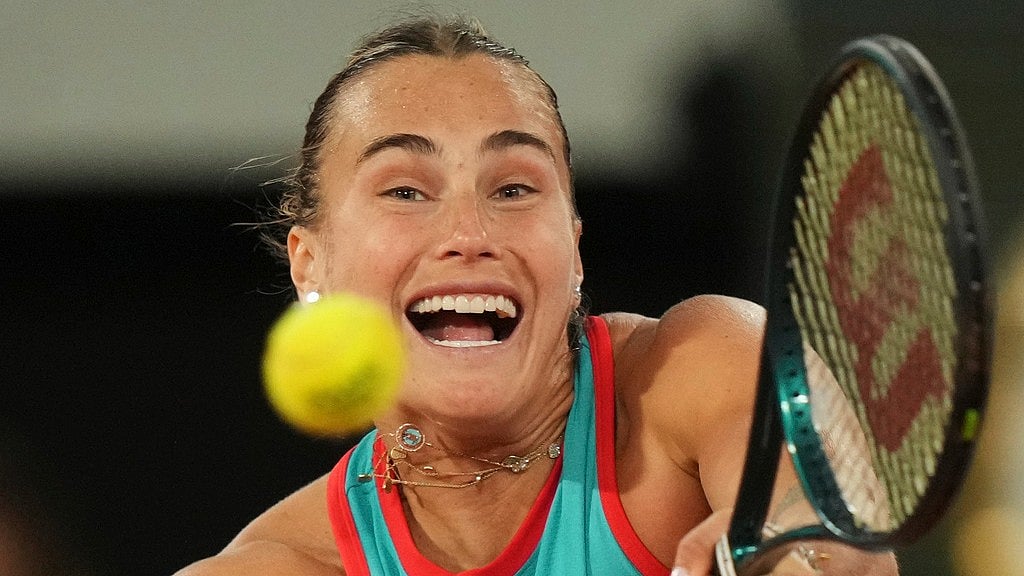 Photo: AP : Aryna Sabalenka of Belarus plays a shot against Poland's Iga Swiatek during their semi-final of the French Open at the Roland Garros stadium in Paris.