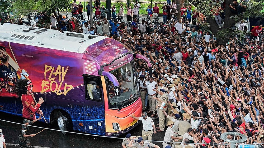 | Photo: AP/Aijaz Rahi : RCB felicitation: Chaos near Bengaluru stadium
