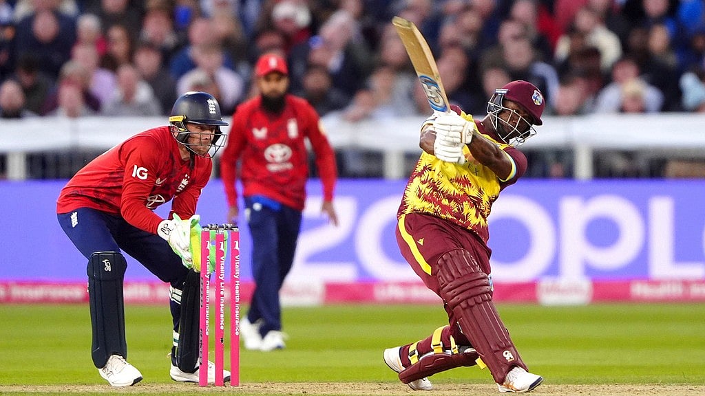 Owen Humphreys/PA via AP : West Indies' Evin Lewis bats during the first men's international Twenty20 match between England and West Indies at Banks Homes Riverside.
