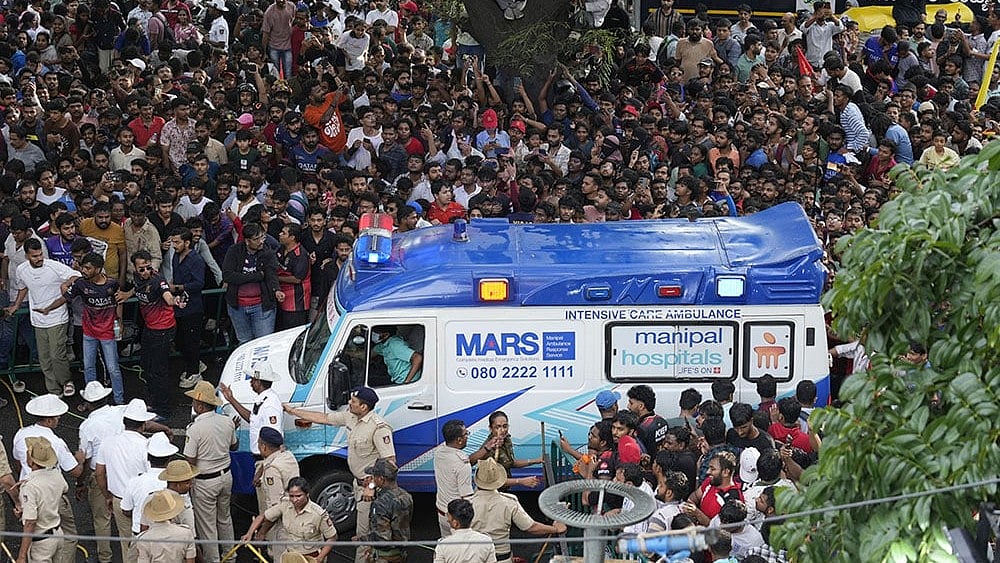 | Photo: AP/Aijaz Rahi : Bengaluru Stampede: Ambulance gathered outside the M Chinnaswamy stadium.
