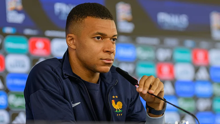 Kylian Mbappe pictured at Saturday's France press conference - null
