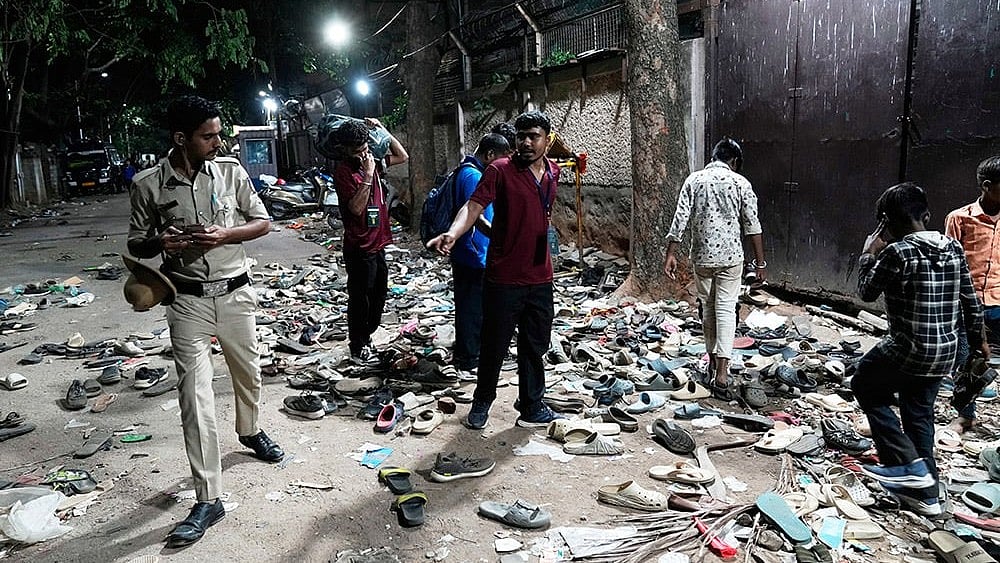 Photo: AP/Aijaz Rahi : RCB felicitation: Stampede near Bengaluru stadium