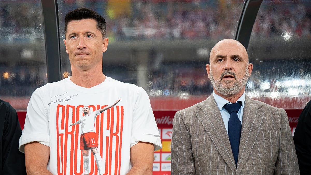 Poland's Robert Lewandowski and Michal Probierz - null