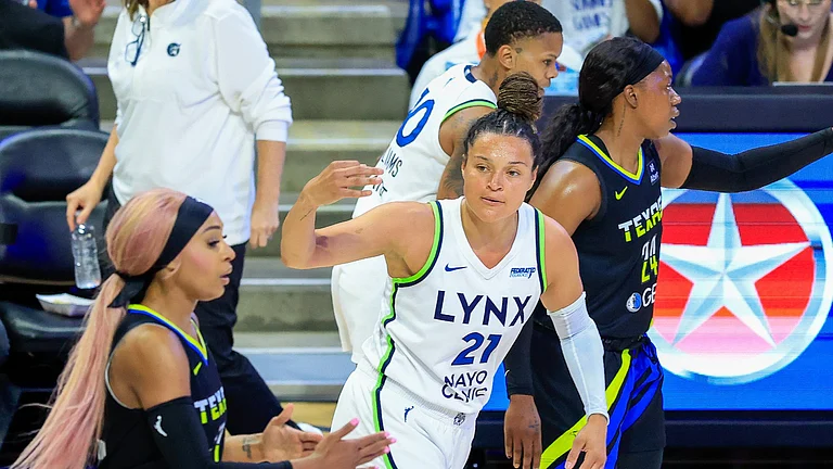 Minnesota Lynx guard Kayla McBride reacts after a basket vs. the Dallas Wings on June 8, 2025. - null