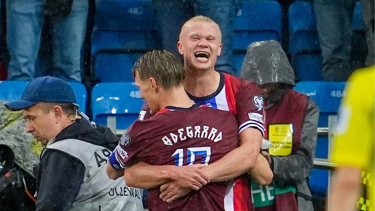 Erling Haaland and Martin Odegaard celebrate Norway's win over Estonia
