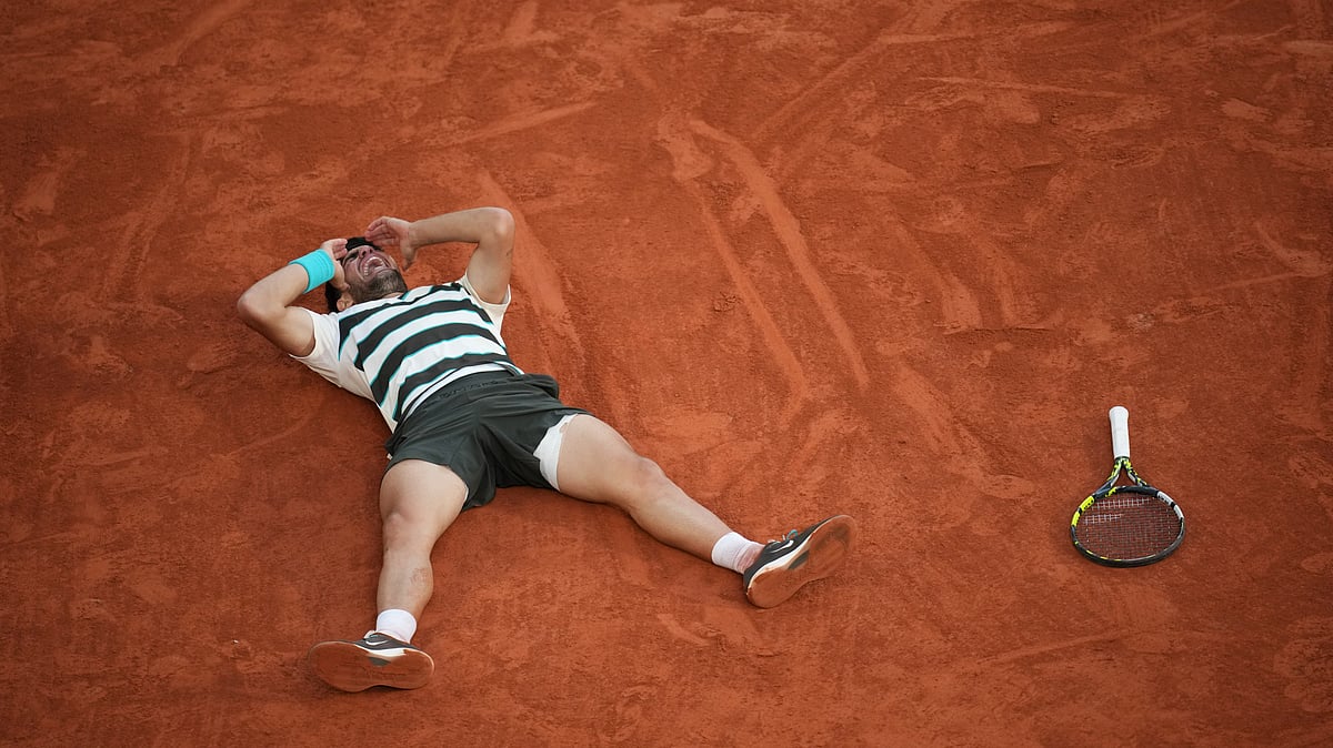 Spain's Carlos Alcaraz creacts after winning the final match of the French Tennis Open at the Roland-Garros against Italy's Jannik Sinner in Paris, Sunday, June 8, 2025. 


 - (AP Photo/Christophe Ena)