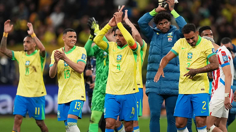 Brazil's players celebrate at the end of a World Cup 2026 qualifying soccer match against Paraguay at Neo Quimica Arena in Sao Paulo, Tuesday, June 10, 2025. Brazil won 1-0. - | Photo: AP/Andre Penner