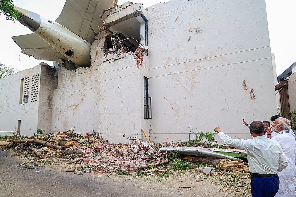 Prime Minister Narendra Modi visits the site of the Air India plane crash