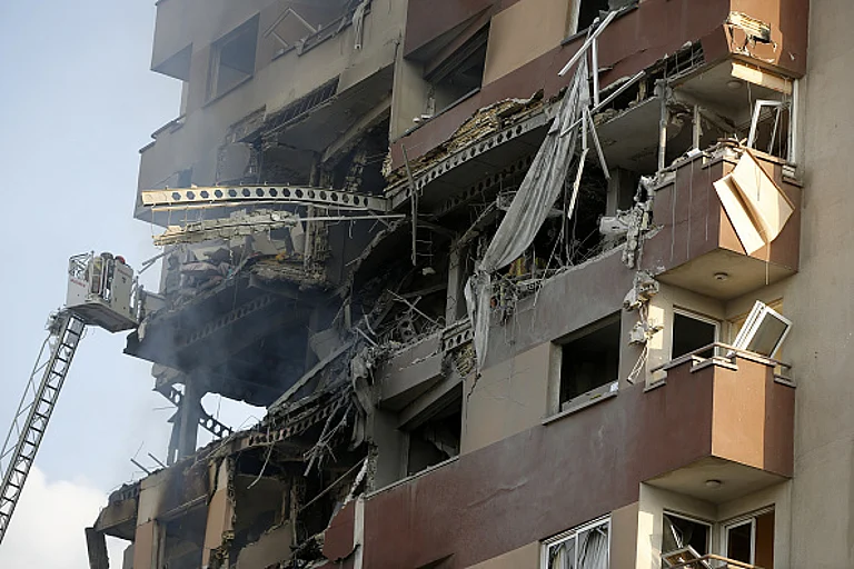 View of a damaged building in Tehran, following an Israeli attack, on June 13 - Fatemeh Bahrami/Anadolu via Getty Images