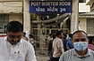 Death Toll Rises in Ahmedabad Plane Crash AP Photo/Rafiq Maqbool : People wait outside the autopsy room of a hospital near the Air India plane crash site in Ahmedabad