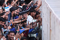 Reel-ing Them In: Cricket In The Age Of Social Media Photo by Michael Steele/Getty Images : AHMEDABAD, INDIA - FEBRUARY 12: India supporters try to get the attention of the England players next to the tunnel during the 3rd ODI match between India and England at Narendra Modi Stadium on February 12, 2025 in Ahmedabad, India.