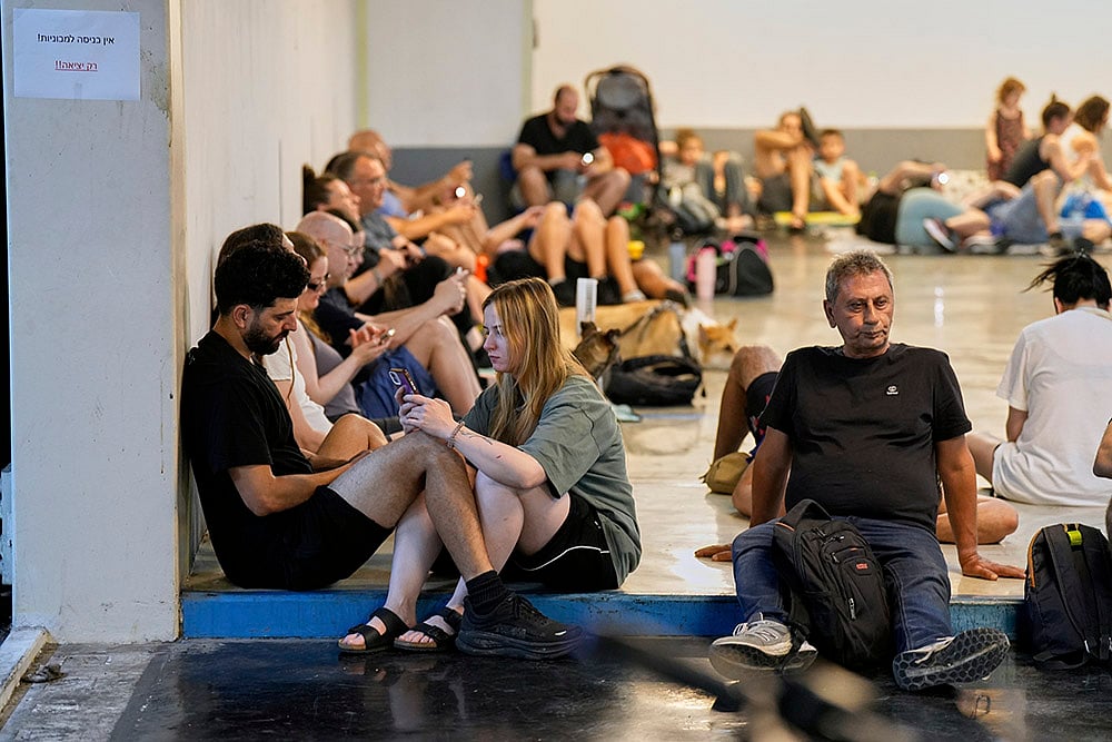 Israel Iran Mideast Wars; Israelis sit in a bomb shelter 