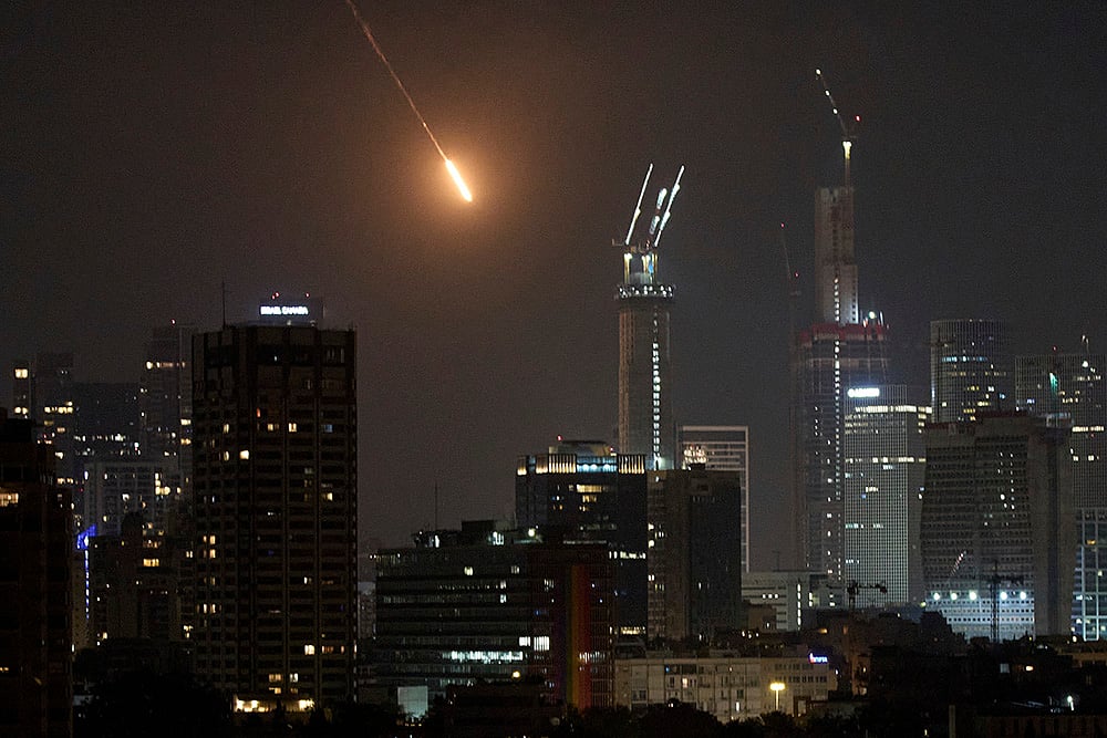 | Photo: AP/Leo Correa : Israel and Iran trade strikes