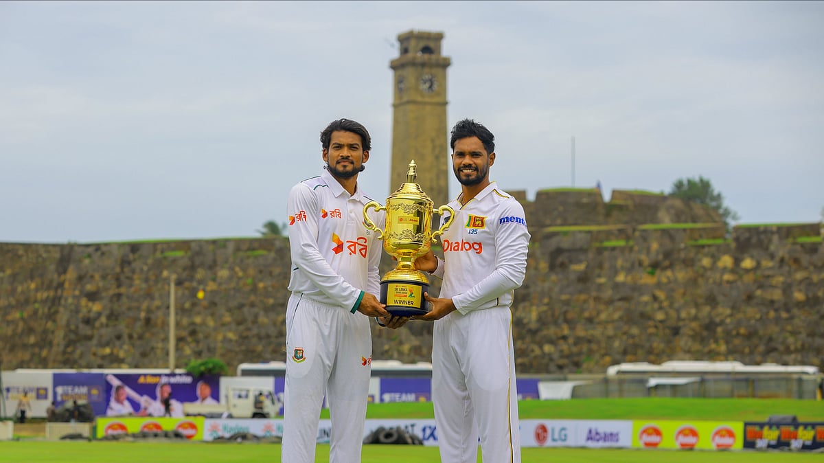 Photo: X | Sri Lanka Cricket : Bangladesh captain Najmul Hossain Shanto (L) with Sri Lanka skipper Dhananjaya de Silva during trophy presentation.