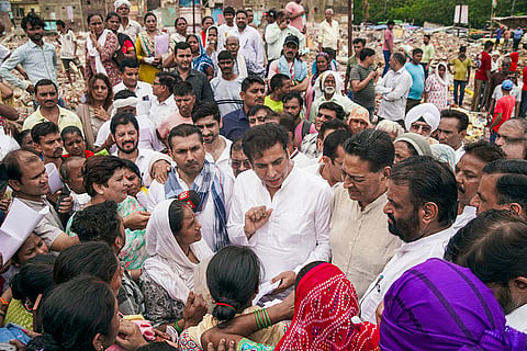 Devender Yadav visits demolished areas in Delhi's Govindpuri